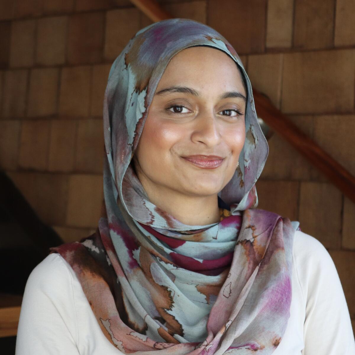 Professional headshot of a woman smiling
