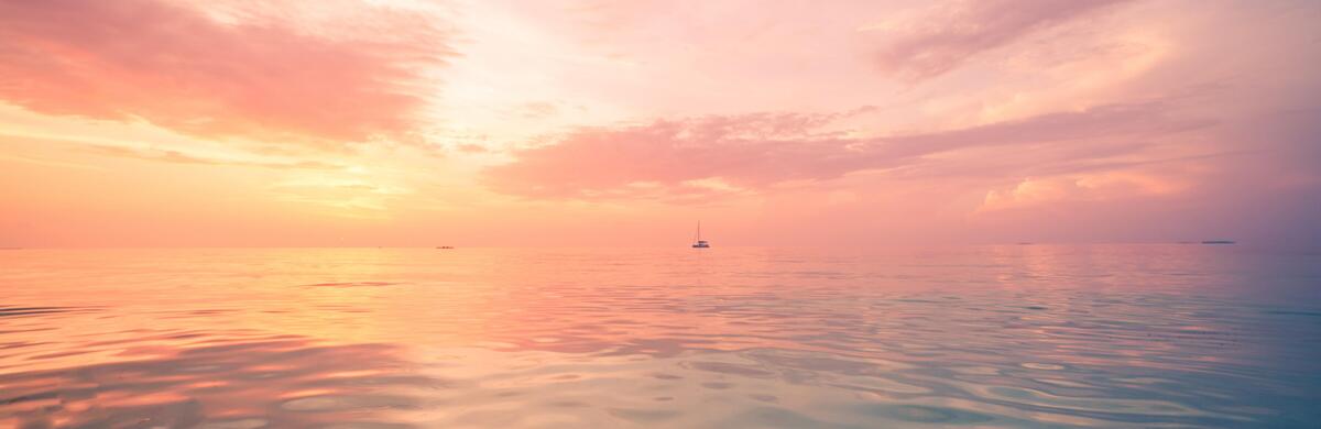 cotton candy sky over ocean