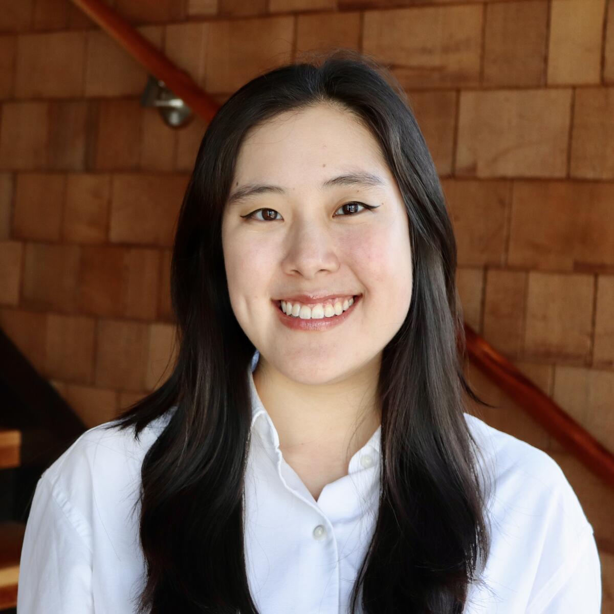 Professional headshot of a woman smiling