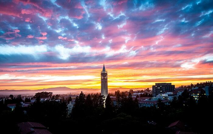 Pink, purple and blue sky at sunset with the Campanile in the forefront
