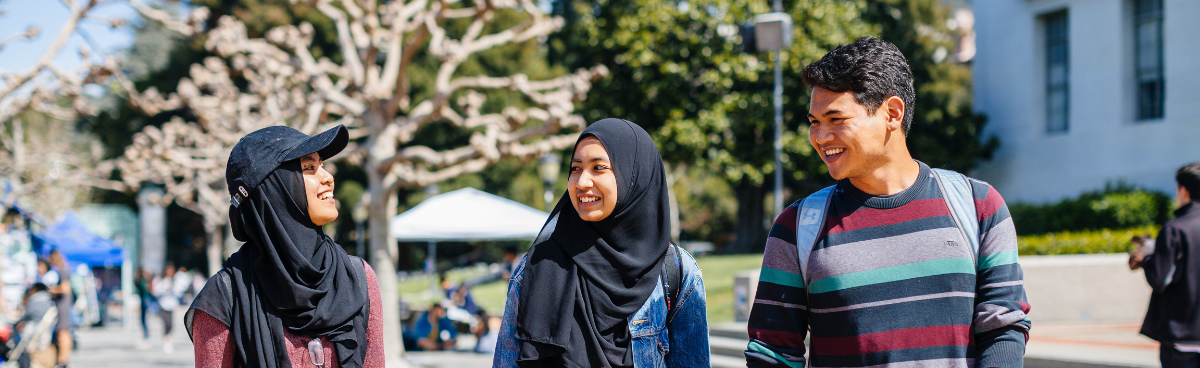 Image of UC Berkeley students walking and talking