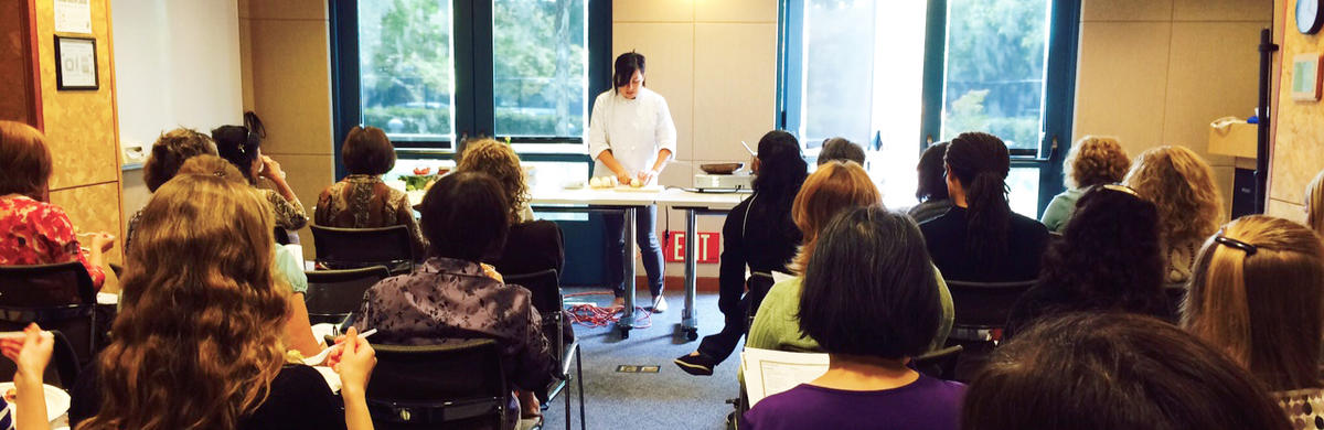Photo of cooking class with registered dietitian in the front.