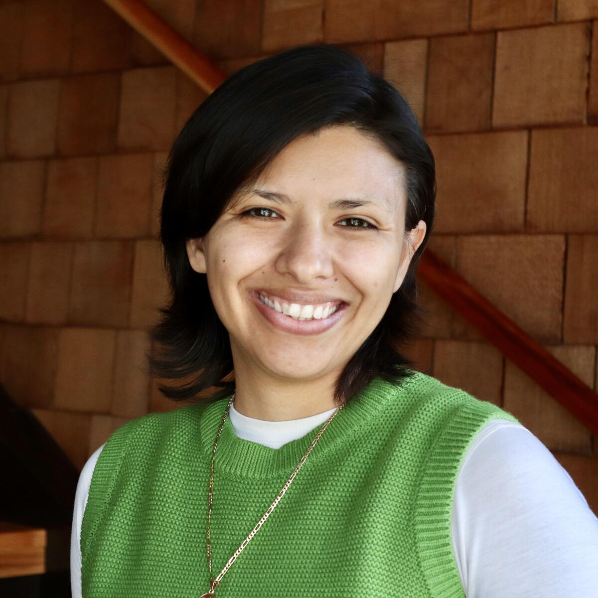 Professional headshot of a woman smiling