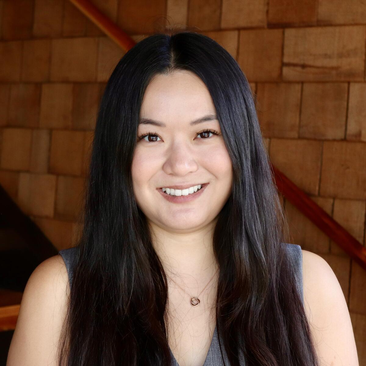 Professional headshot of a woman smiling