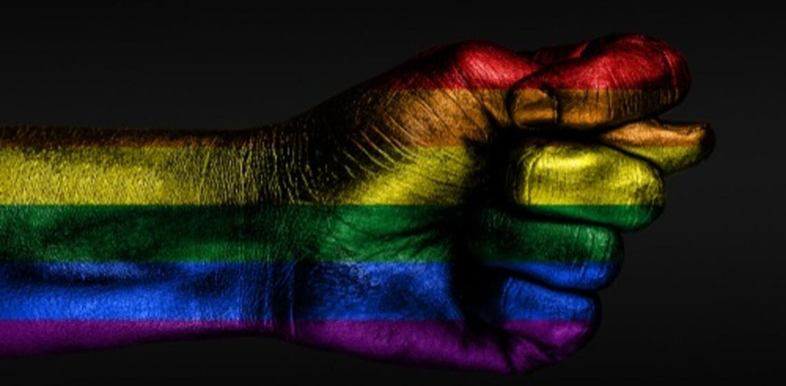 LGBT support, hands and rainbow colors spectrum flag