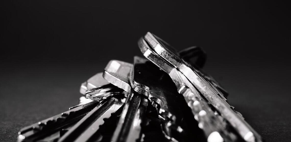 Black and white photo of a close up of a bunch of keys