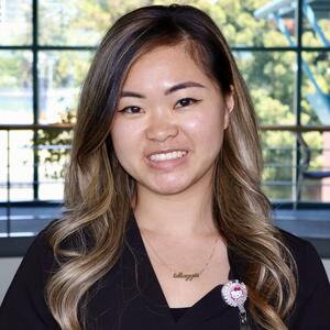 A headshot of a Registered Nurse