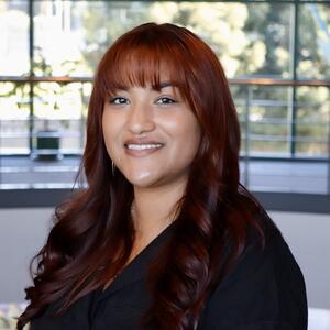 Professional headshot of a woman smiling