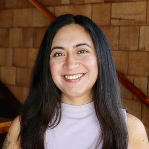 Professional headshot of a woman smiling