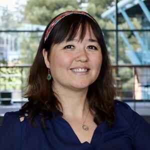 Professional headshot of a woman smiling
